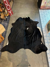 cowhide rug black and white